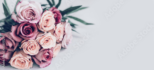 Fototapeta Naklejka Na Ścianę i Meble -  Bouquet of multicolored roses in vintage style