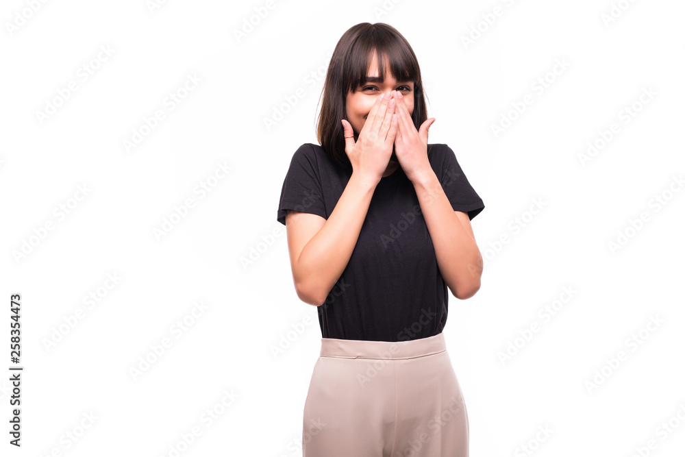 Portrait of shocked brunette woman with mouth open looking away isolated on a gray background Portrait of shocked brunette woman with mouth open looking away isolated on a gray background
