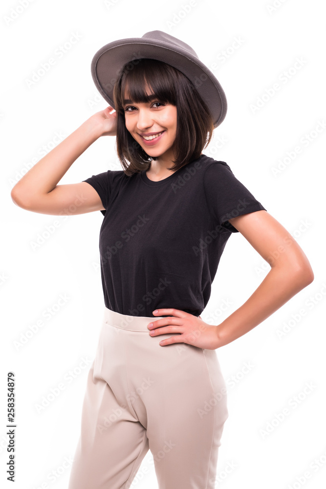 Portrait of a young playful woman with floppy hat on white background Portrait of a young playful woman with floppy hat on white background