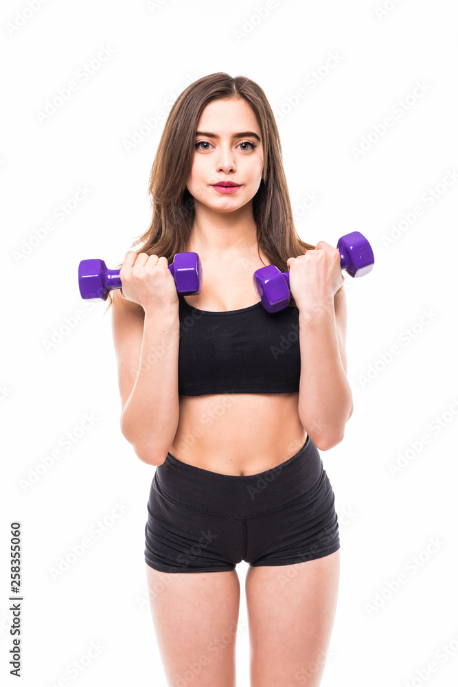 Photo of slim sporty woman doing exercises with small dumbbells isolated over white background Photo of slim sporty woman doing exercises with small dumbbells isolated over white background