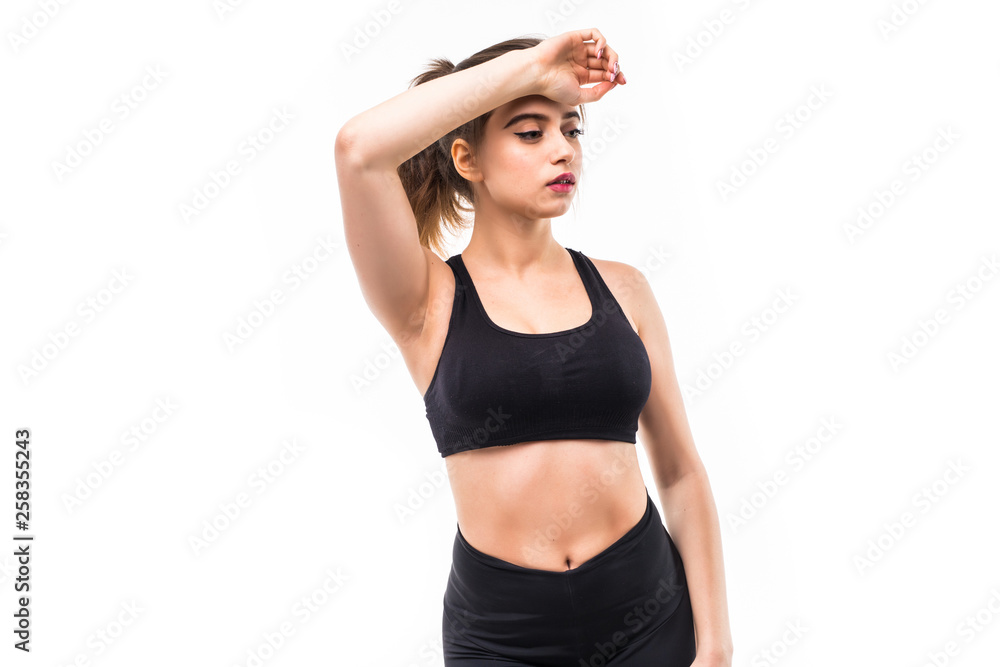 Portrait of sporty woman look tired after workout on white background Portrait of sporty woman look tired after workout on white background