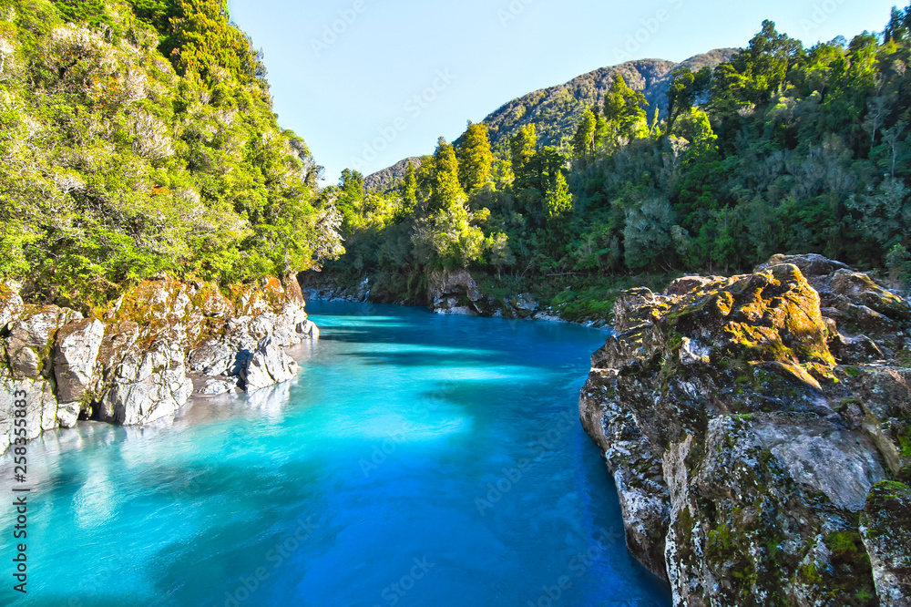 Deep blue water fills the Hokitika Gorge on New Zealand's south island.
