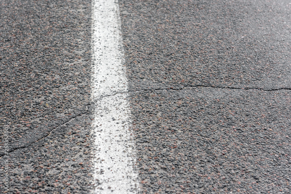 Cracks on the asphalt road. Cracks on the asphalt road.