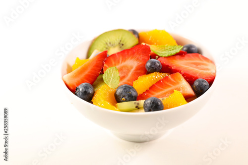 bowl fruit salad isolated on white background