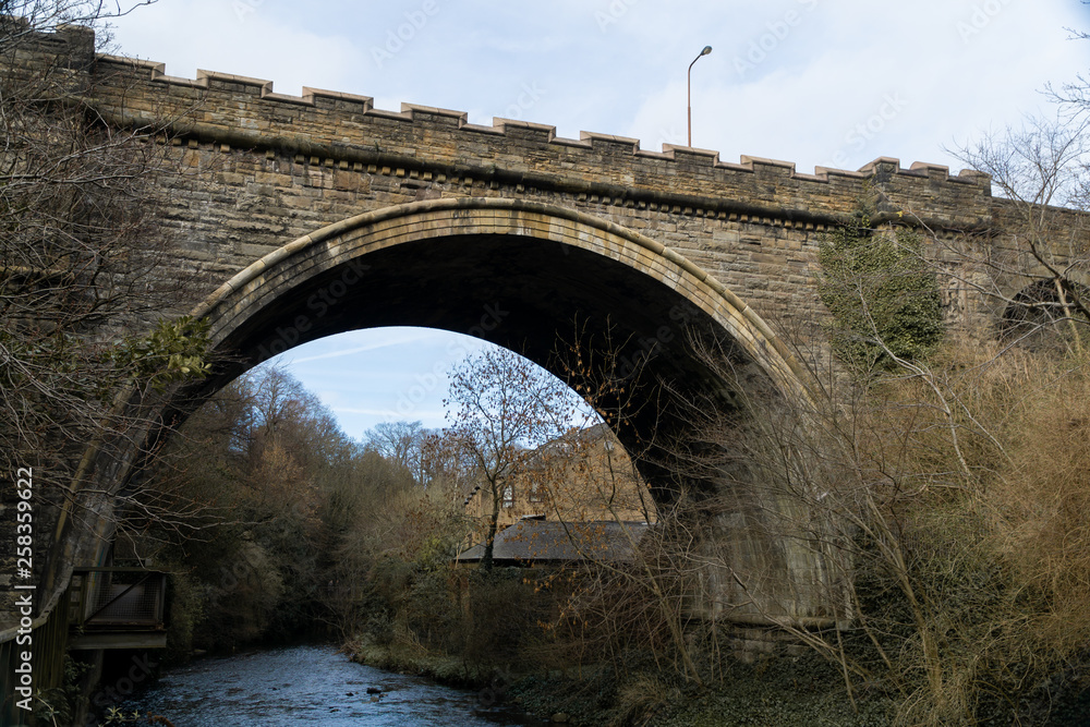 An old medieval bridge in Dean Village, Edinburgh, Scotland. 