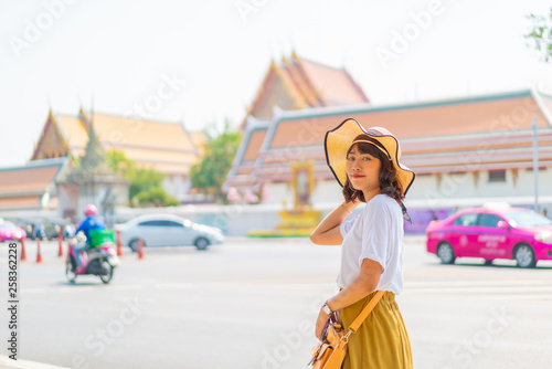 Happy Asian Woman Travel at temple in Thailand © topntp