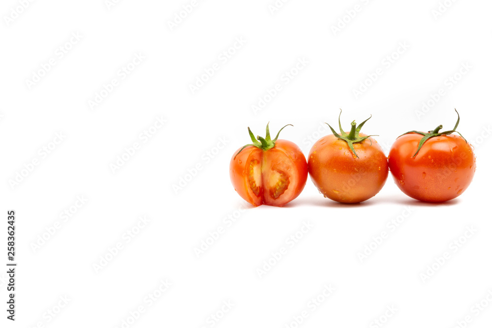 Tomato closeup on white background. Selective focus and crop fragment Tomato closeup on white background. Selective focus and crop fragment