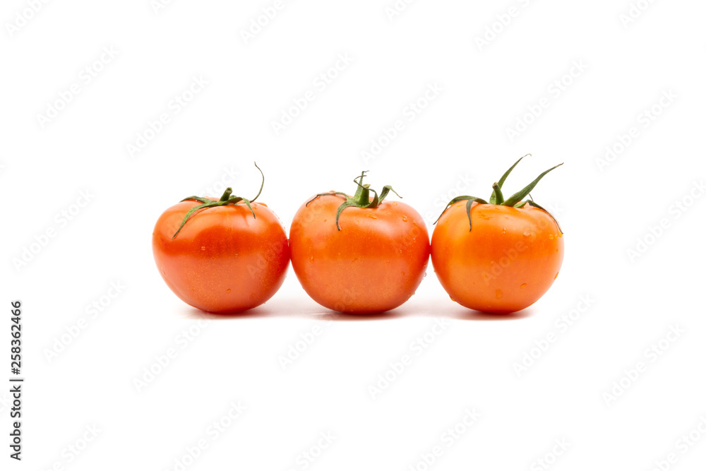 Tomato closeup on white background. Selective focus and crop fragment Tomato closeup on white background. Selective focus and crop fragment