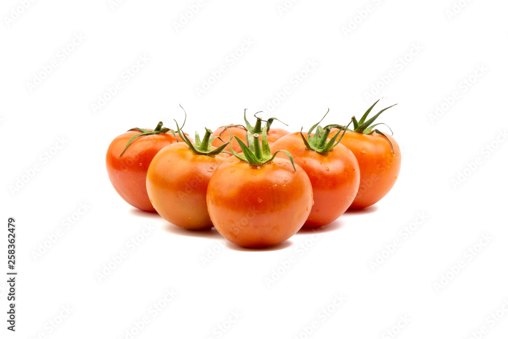 Tomato closeup on white background. Selective focus and crop fragment Tomato closeup on white background. Selective focus and crop fragment