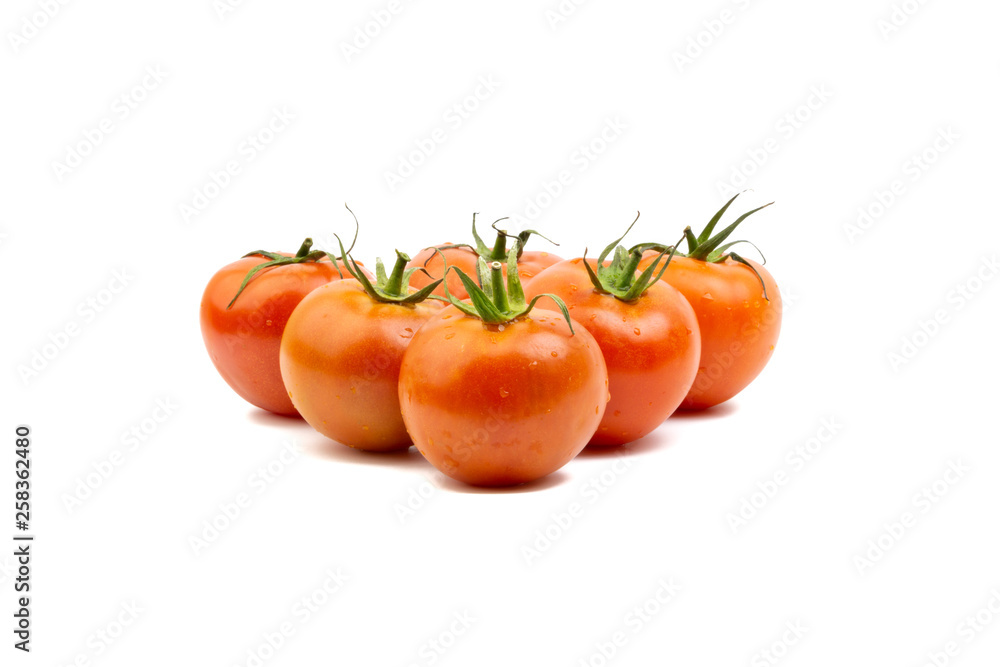 Tomato closeup on white background. Selective focus and crop fragment Tomato closeup on white background. Selective focus and crop fragment
