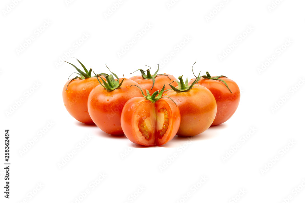Tomato closeup on white background. Selective focus and crop fragment Tomato closeup on white background. Selective focus and crop fragment