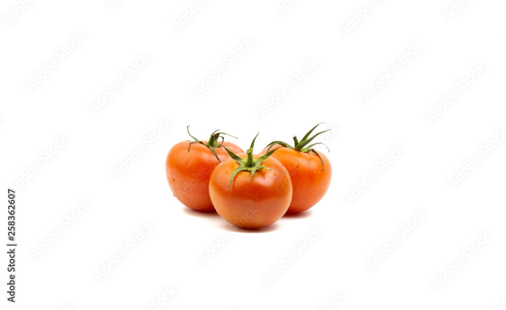 Tomato closeup on white background. Selective focus and crop fragment Tomato closeup on white background. Selective focus and crop fragment