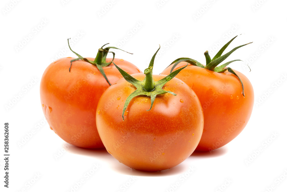 Tomato closeup on white background. Selective focus and crop fragment Tomato closeup on white background. Selective focus and crop fragment