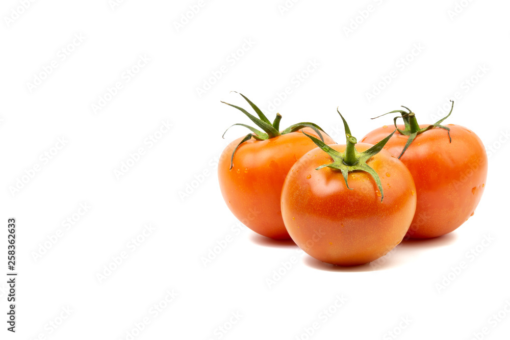 Tomato closeup on white background. Selective focus and crop fragment Tomato closeup on white background. Selective focus and crop fragment