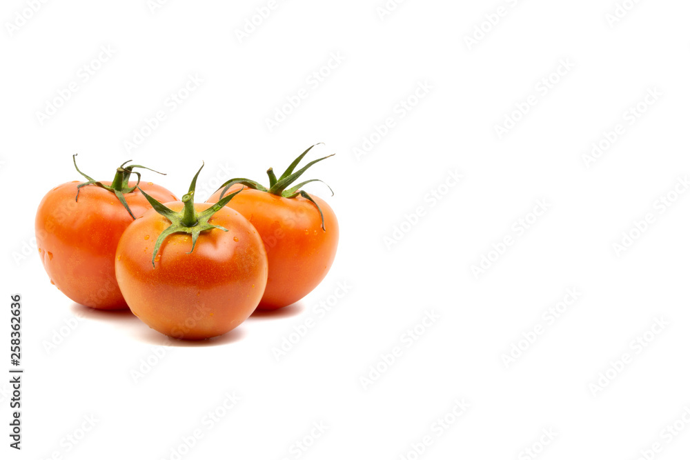 Tomato closeup on white background. Selective focus and crop fragment Tomato closeup on white background. Selective focus and crop fragment