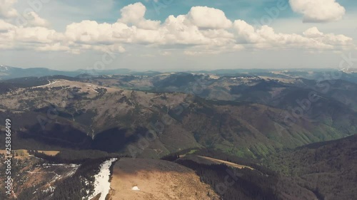 Panoramic view of mountain slopes covered with wood photo