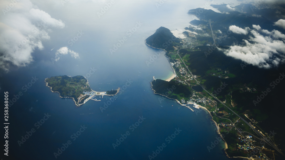 Aerial view of Busan city from above with clouds in South Korea Aerial view of Busan city from above with clouds in South Korea
