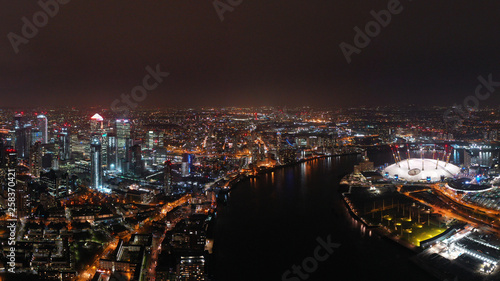 Aerial drone night photo from iconic isle of Dogs peninsula and Docklands area, London, United Kingdom