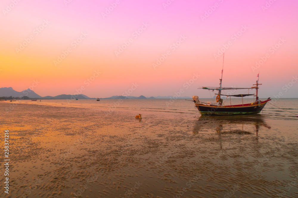 beautiful seascape landscape sea beach mountain with boat  silhouette photography at sunset pastel colorful sky nature backgroun