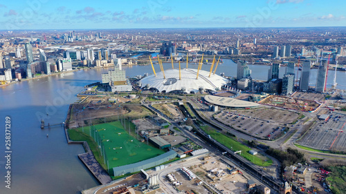Aerial drone bird's eye view of iconic concert Hall of O2 Arena in Greenwich Peninsula, London, United Kingdom