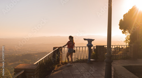 Fotografie Woman at Sunset