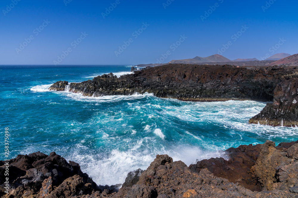 Spain, Lanzarote, Impressive giant waves in los hervideros bay