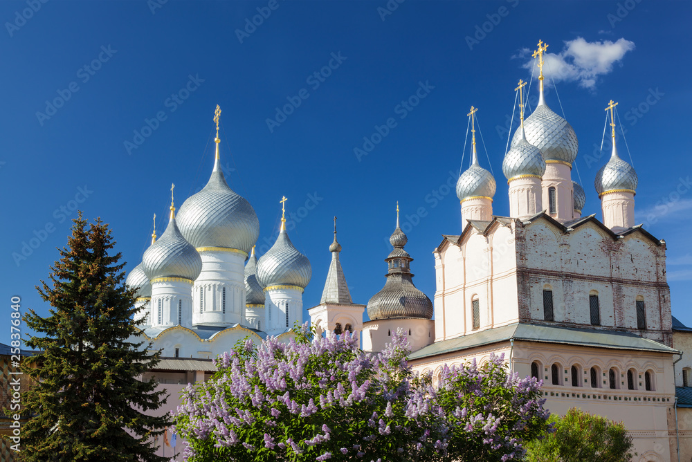 Domes of the Kremlin cathedrals of Rostov the Great on a Sunny spring day. Golden ring, Russia