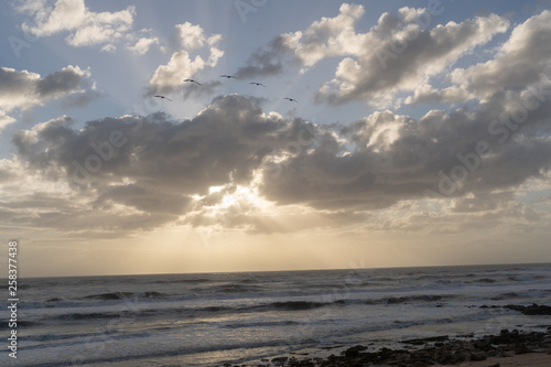 Heavenly sunsire over beach photo