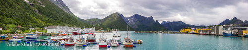 Husoy harbor near Senja island in Norway © tmag