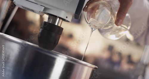 Laboratory experiment in front of shiny blurry background