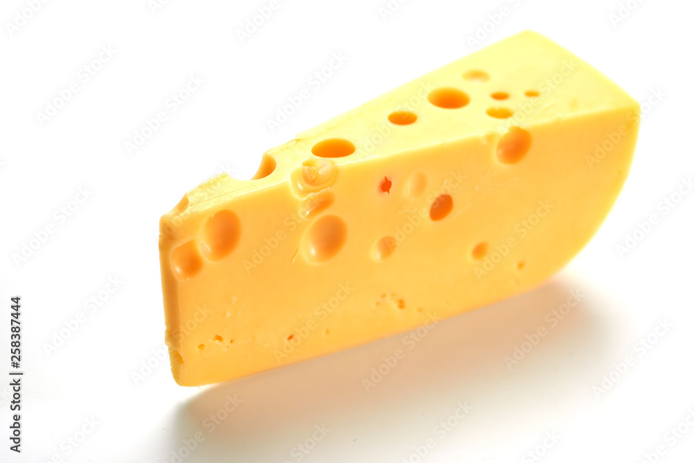 Cheese with big holes on a white background Cheese with big holes on a white background