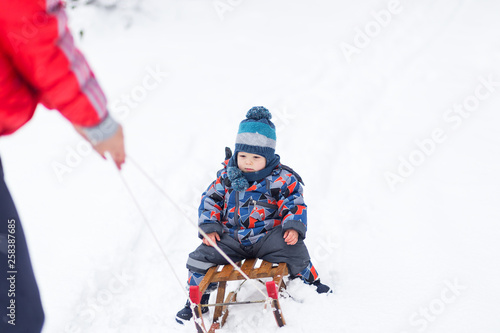 Kid enjoy at sledge