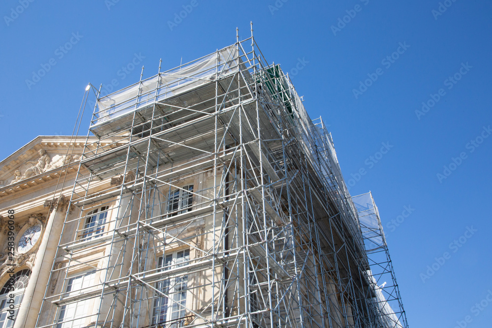 Scaffolding of a construction site in blue sky