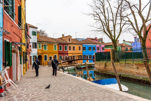Italy  Venice  Burano  canals and boats among the typical colored houses.