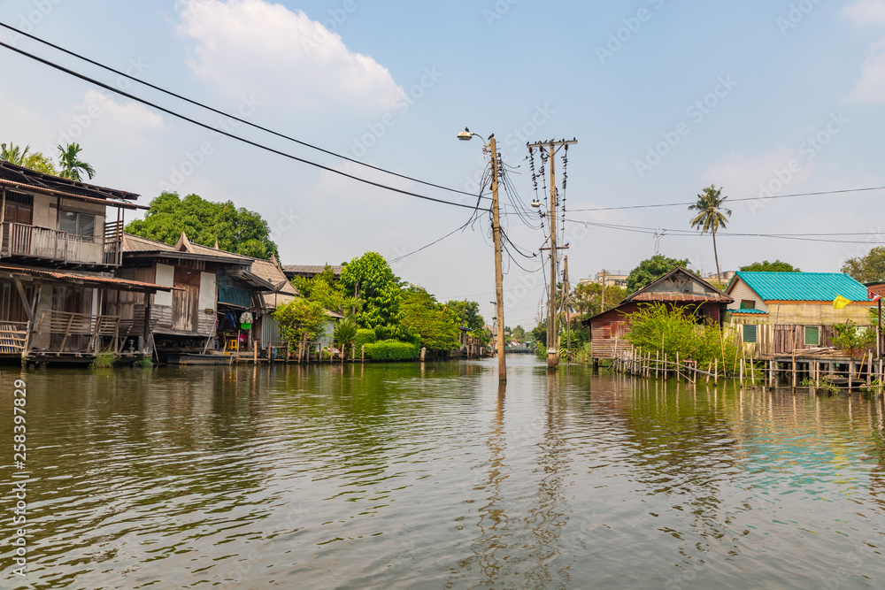 Shanty houses along Bangkok water canals, Thailand Shanty houses along Bangkok water canals, Thailand