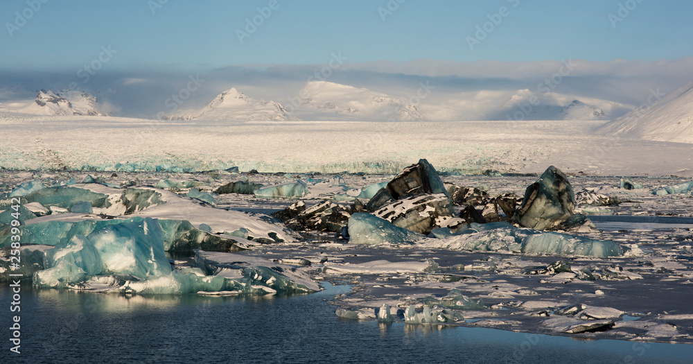 Blue ice over Icelandic lagoon