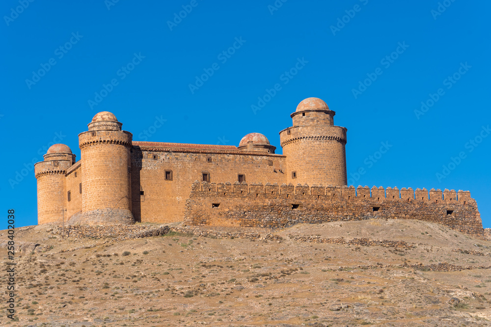 La Calahorra castle with Renaissance courtyard aerial panorama view near Almeria in Andalusia Spain, below the Sierra Nevada