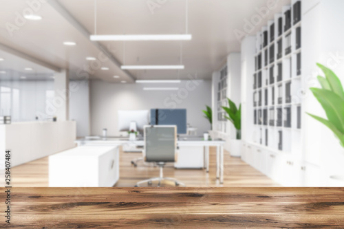 Modern white office interior with furniture.