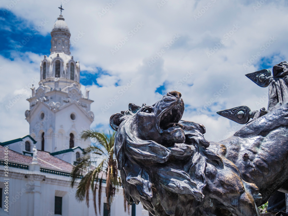 Lion statue at Plaza Grande in the historical center of Quito, Ecuador