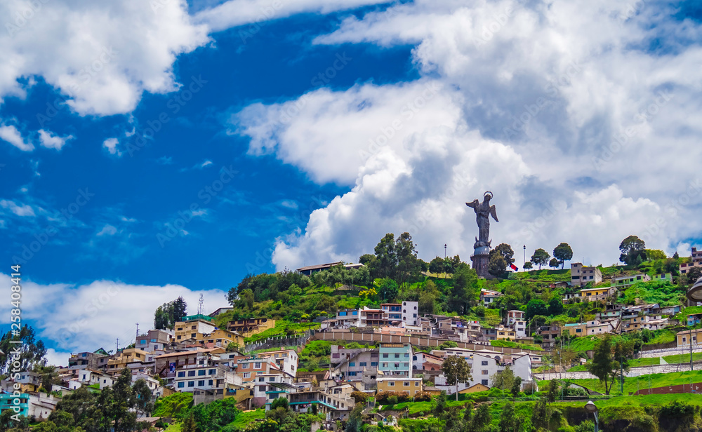 Beautiful view of Virgen del Panecillo statue on top of a hill in the historical center of Quito Ecuador