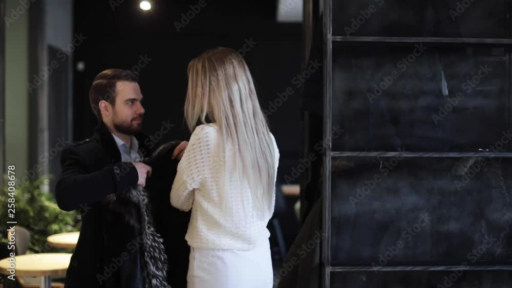 A man and a woman came to a business meeting in a cafe with friends. To develop a startup plan. A man and a woman came to a business meeting in a cafe with friends. To develop a startup plan.