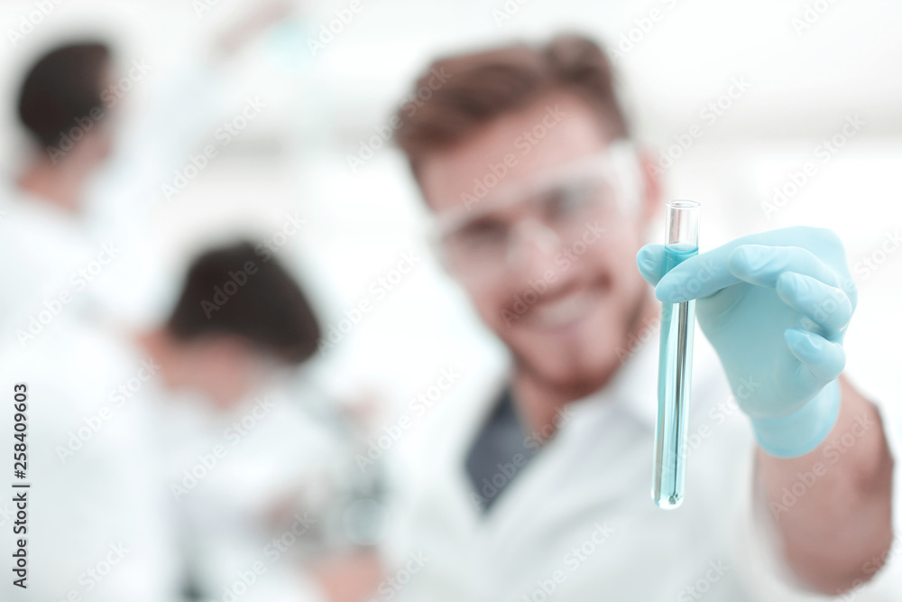 closeup. scientist with beaker