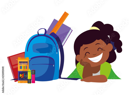 happy little black schoolgirl with schoolbag and supplies