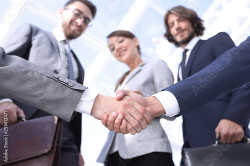 Фотография in the foreground.handshake of business partners
