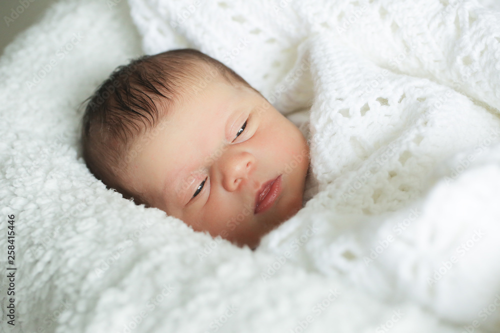 Newborn Cute Baby Girl, Infant, Sleeping on the white bed, New family concept, The most Beautiful Baby Princesse Newborn Cute Baby Girl, Infant, Sleeping on the white bed, New family concept, The most Beautiful Baby Princesse