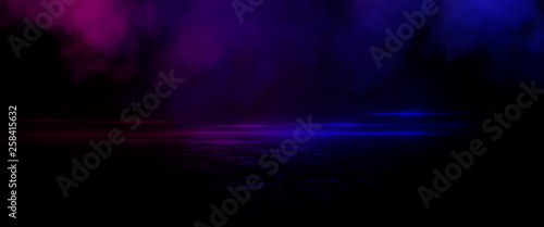 Wet asphalt, reflection of neon lights, a searchlight, smoke. Smoke, smog. Dark background scene of empty street, night view, night city. Neon red and blue light.