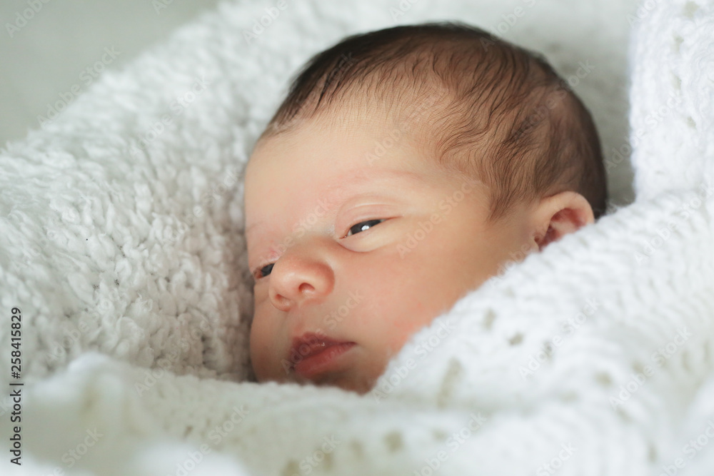 Newborn Cute Baby Girl, Infant, Sleeping on the white bed, New family concept, The most Beautiful Baby Princesse Newborn Cute Baby Girl, Infant, Sleeping on the white bed, New family concept, The most Beautiful Baby Princesse