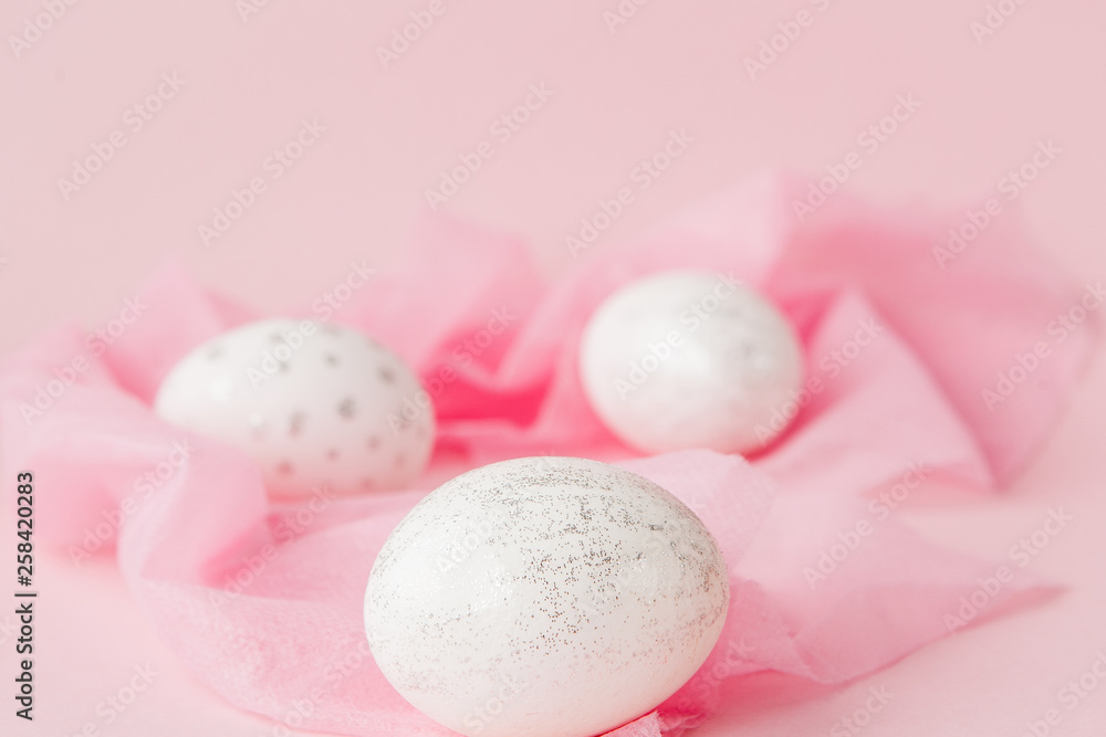 White Easter eggs on pink background with copy space. Top view shot of arrangement decoration Happy Easter holiday background concept. Design pastel tone in minimal flat lay White Easter eggs on pink background with copy space. Top view shot of arrangement decoration Happy Easter holiday background concept. Design pastel tone in minimal flat lay