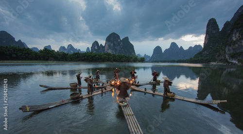 Obraz na plátně Fisherman on Li River at night