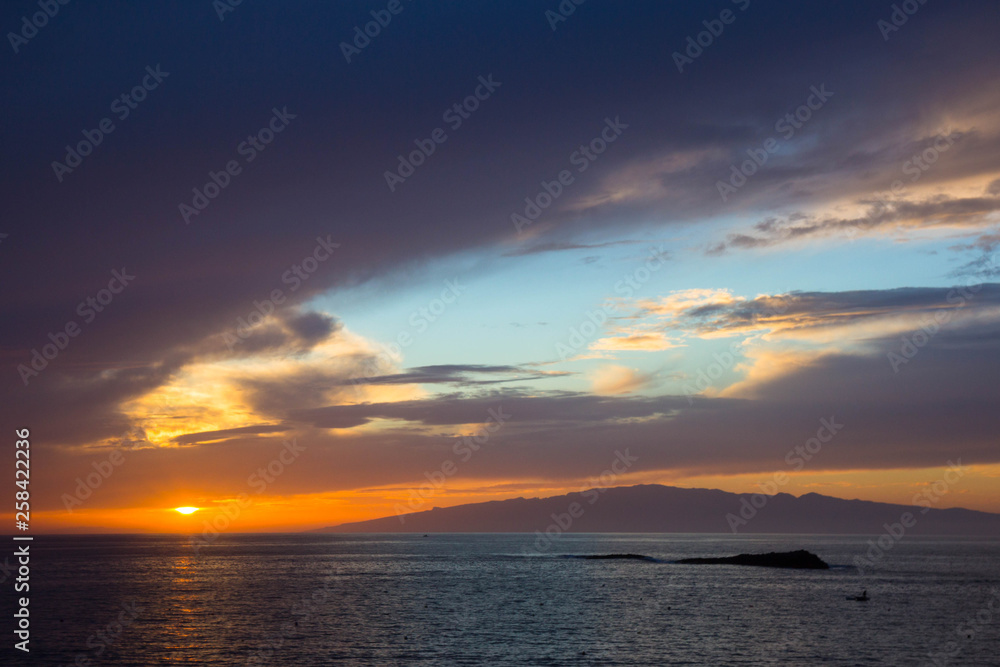 beautiful sunset over the Atlantic ocean at Costa Adaje, Tenerife Island, Spain